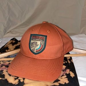 Orange bass pro hat